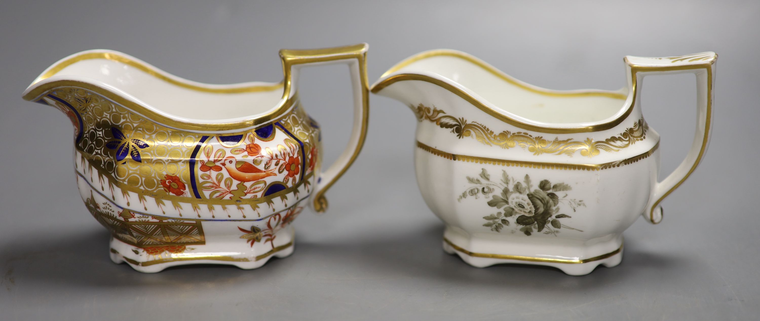 A Spode cream jug painted with Imari pattern 1495, and a Spode cream jug painted with sepia flowers under a gold border, pattern 3527,